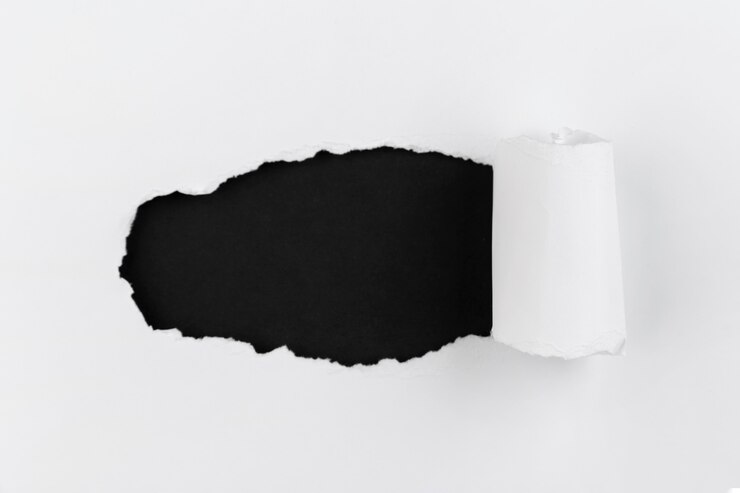 Kostenlose Foto draufsicht zerbröckelte papier
