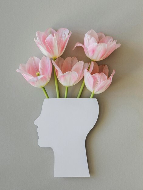 Draufsichtzusammensetzung des Optimismuskonzepts mit Blumen