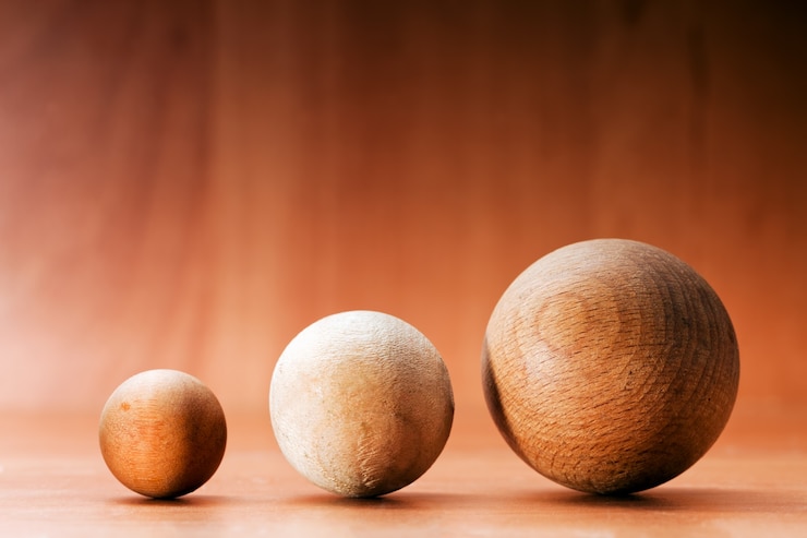 Kostenlose Foto drei kugeln aus holz