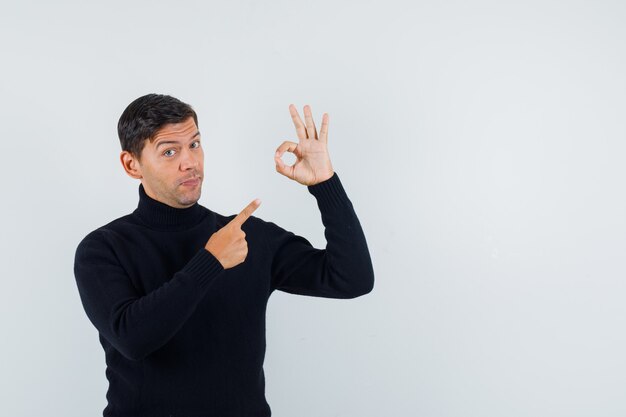 Ein ausdrucksstarker Mann posiert im Studio