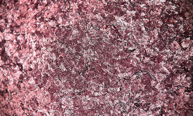 Kostenloses Foto ein rosa und lila glitterhintergrund