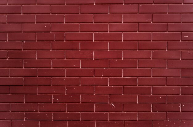 Einfache helle rote Backsteinmauer