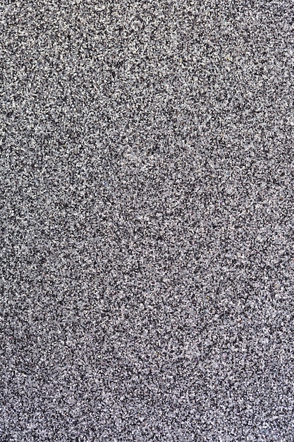 Festlicher monochromatischer glänzender Glitzerbeschaffenheitshintergrund