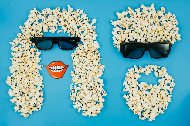 Kostenloses Foto flache lage des popcorns und der gläser 3d für kinokonzept