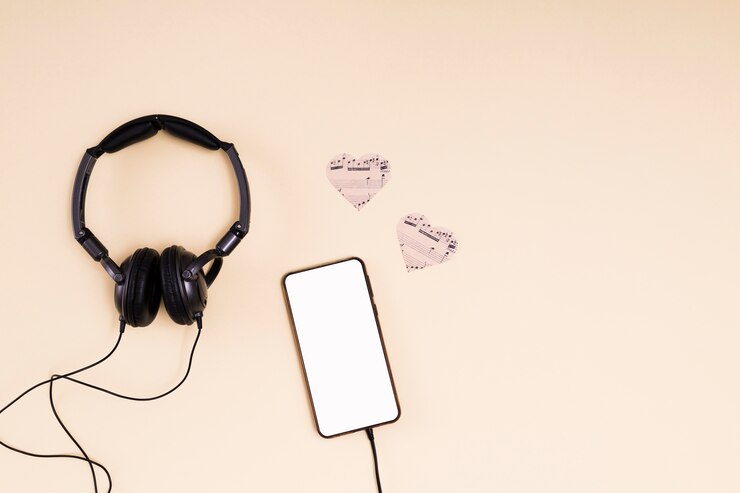Kostenlose Foto flache lage smartphoneschablone mit musikkonzept
