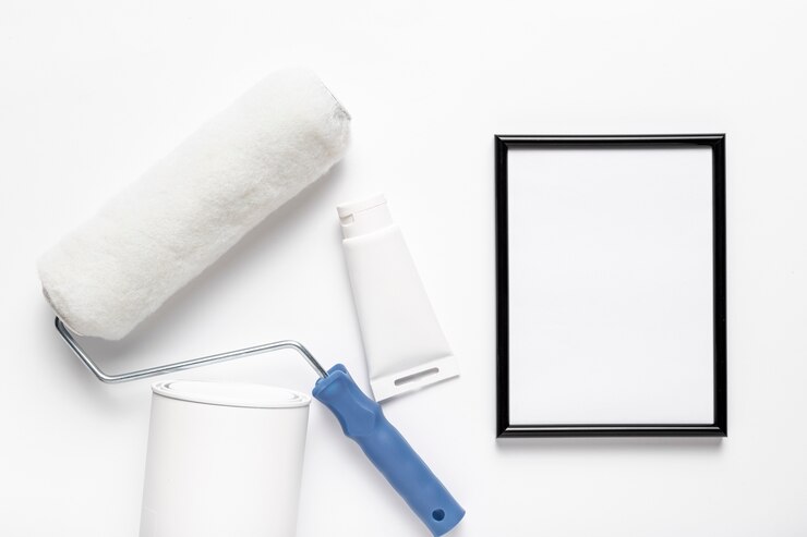 Kostenlose Foto flachleger mit rahmen und walzenbürste