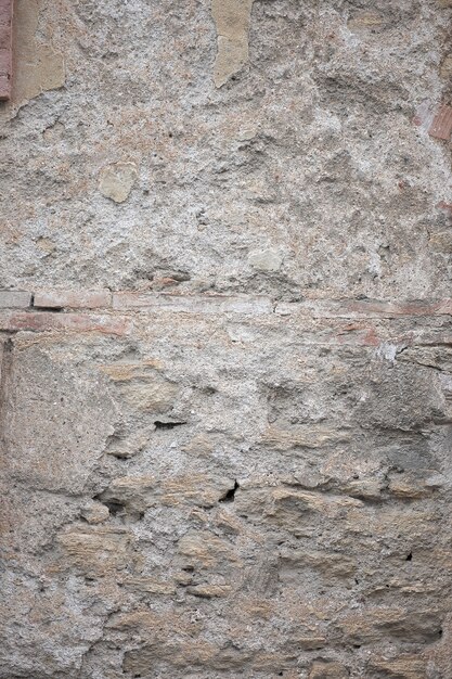 Fragment der alten grungy Beschaffenheit mit abgebrochener Farbe und Sprüngen oder graue Betonmauer- und Zementoberfläche