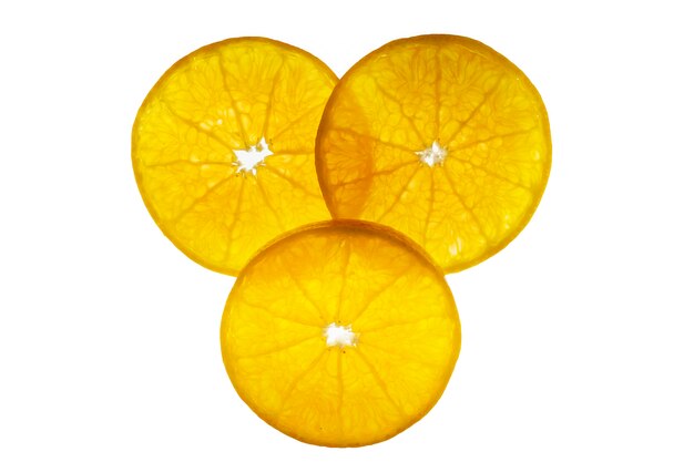 Frische geschnittene saftige orange Frucht stellte über weiß- tropische orange Fruchtbeschaffenheit für Gebrauch ein