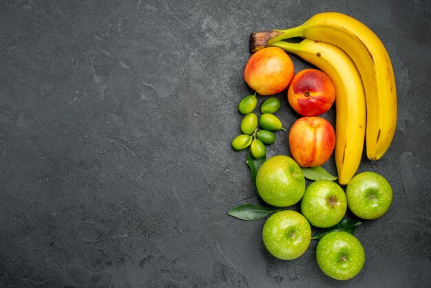 Früchte Zitrusfrüchte grüne Äpfel mit Blättern Nektarinen und Bananen