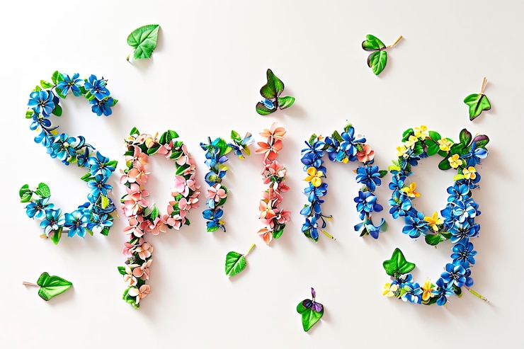 Kostenlose Foto frühling mit bunten blumen auf weißem hintergrund
