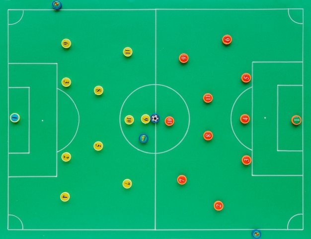 Kostenloses Foto fußballhintergrund mit taktikkonzept