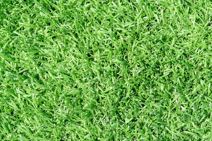 Kostenlose Foto fußballplatz-hintergrundbeschaffenheit des künstlichen grases der draufsicht
