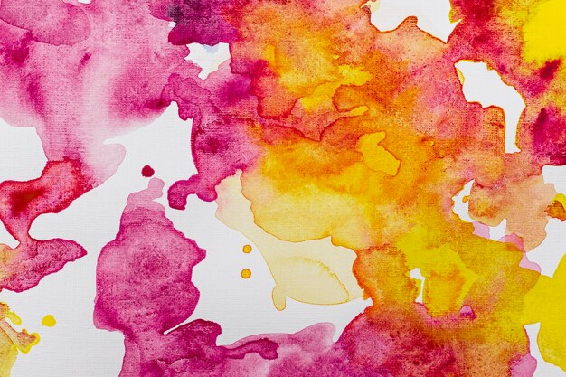 Gelber und lebhafter rosa Aquarellkopierraummusterhintergrund