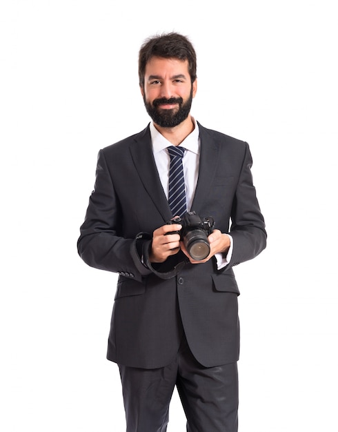 Geschäftsmann fotografiert über weißem Hintergrund