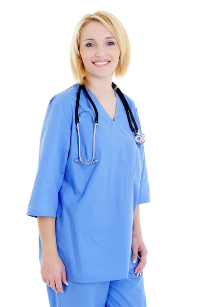 Glückliche Medizinstudentin in blauer Uniform - lokalisiert auf Weiß