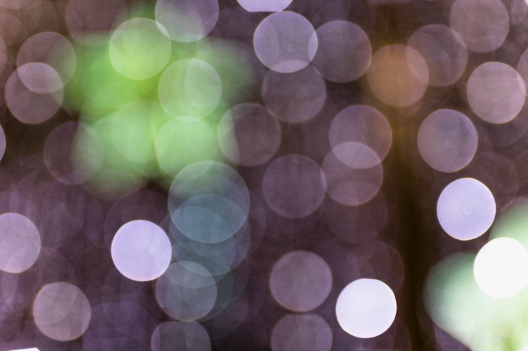 Kostenlose Foto glühender glänzender bokeh-hintergrund