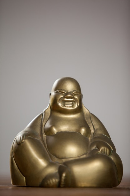 Gold painted Buddha Figur lachend