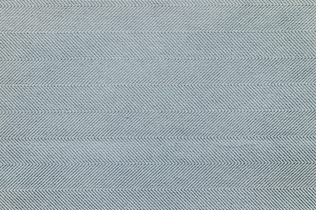 Grauer teppich mit strukturiertem hintergrund
