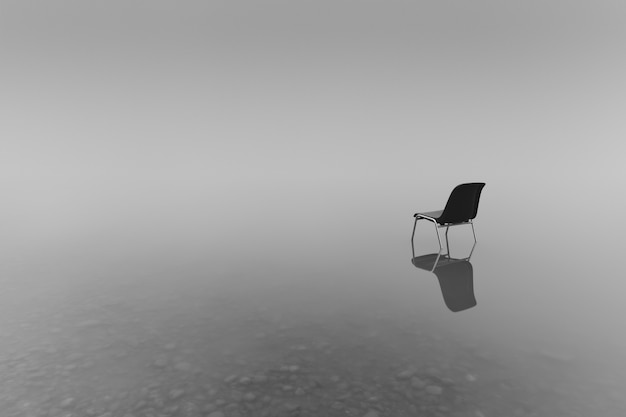 Graustufenaufnahme eines Stuhls auf einem kleinen Teich - Konzept der Einsamkeit