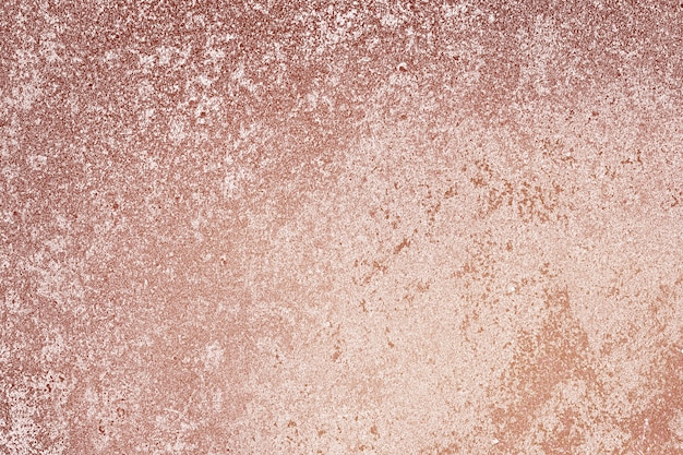 Grob roségold lackierter Betonwandoberflächenhintergrund