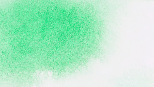 Grüne Farben auf weißem Papier