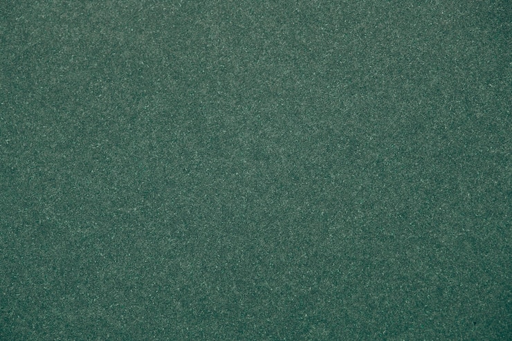 Kostenlose Foto grüner glitter strukturierter papierhintergrund