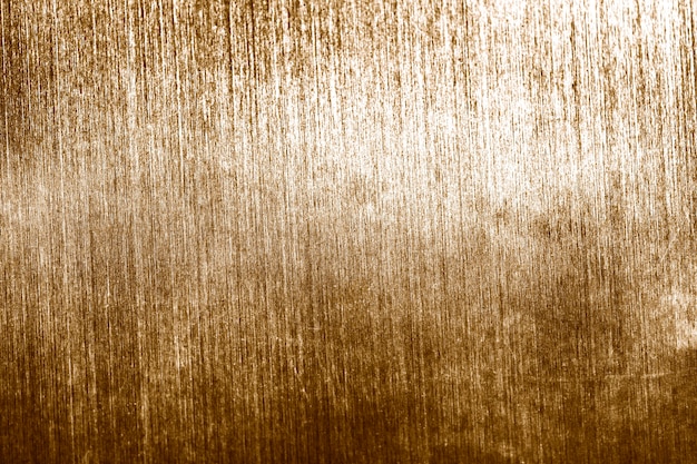 Grunge verblasster gold strukturierter Hintergrund