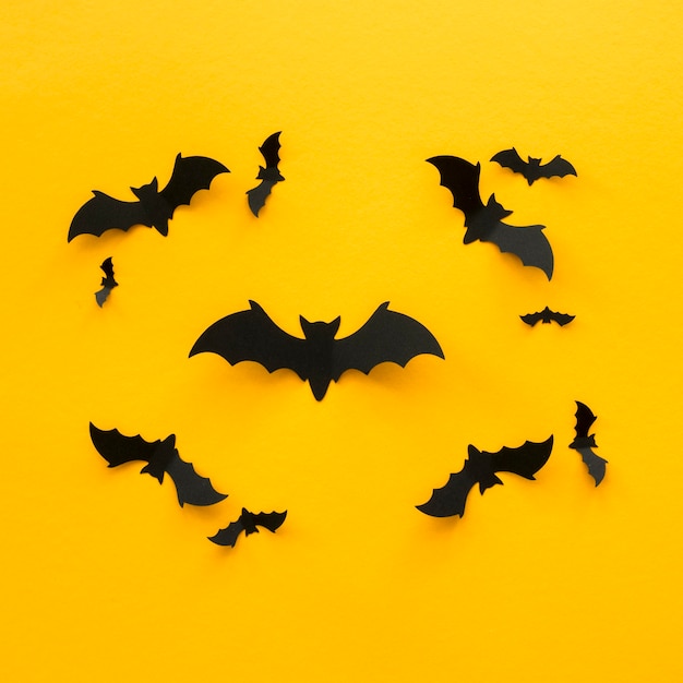 Gruseliges Halloween-Konzept der Draufsicht mit Fledermäusen