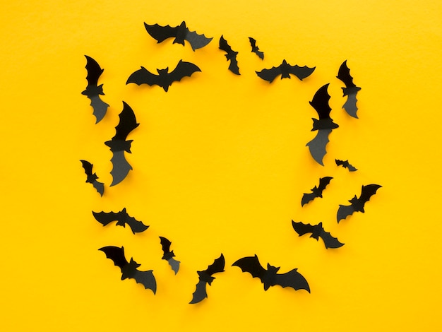 Gruseliges Halloween-Konzept der Draufsicht mit Fledermäusen
