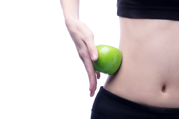 Gute gesunde Körper- und Kurven-Taille und grüner Apfel