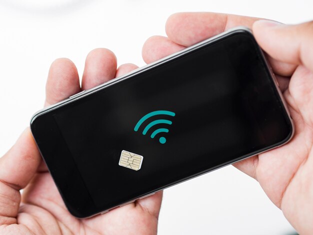 Hande Halten Telefon Mit Sim Karte An Der Spitze Kostenlose Foto