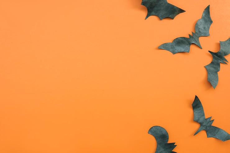 Kostenlose Foto halloween-anwendung in schwarz und orange farben mit fledermäusen