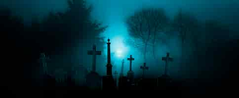 Kostenloses Foto halloween tapete mit friedhof bei nacht