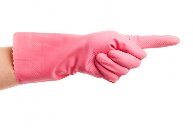 Hand in einem rosa Haushandschuh zeigt