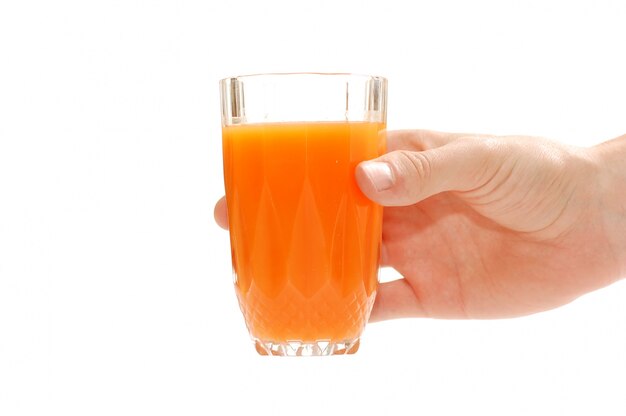 Hand mit Orangensaft