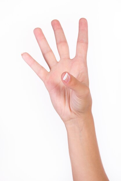 Hand zeigt vier Finger
