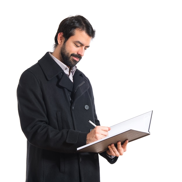 Handsome man reading book