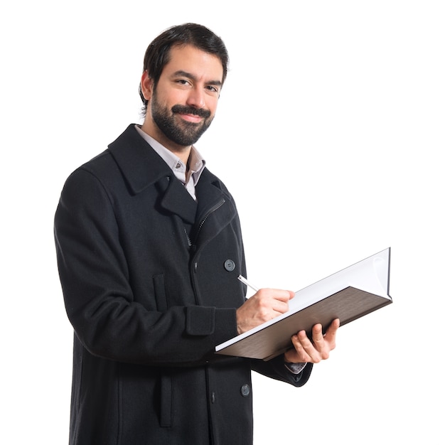 Handsome man reading book