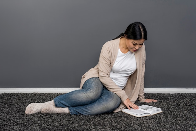 High angle woman reading