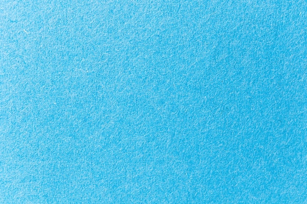 Himmelblaue papierstruktur, farbiger kartonoberflächenhintergrund, leeres raumfoto