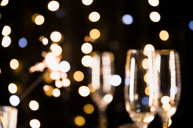 Kostenloses Foto hintergrund des neuen jahres mit champagner