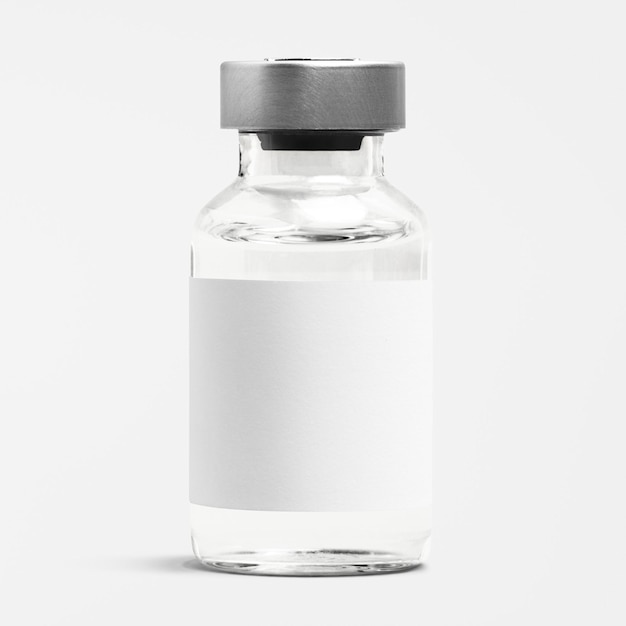 Kostenloses Foto injektionsflasche aus glasfläschchen mit leerem weißem etikett