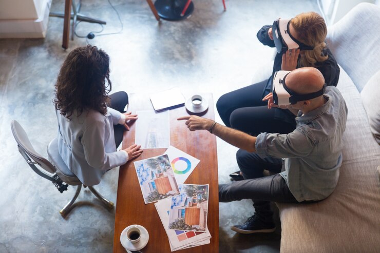 Kostenlose Foto innenarchitektkunden in vr-gläsern, die luft berühren