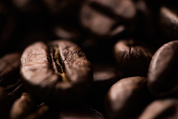 Kaffeebohnen hintergrund geröstete signaturbohne mit reichem geschmack bestes morgengetränk und luxusmischung
