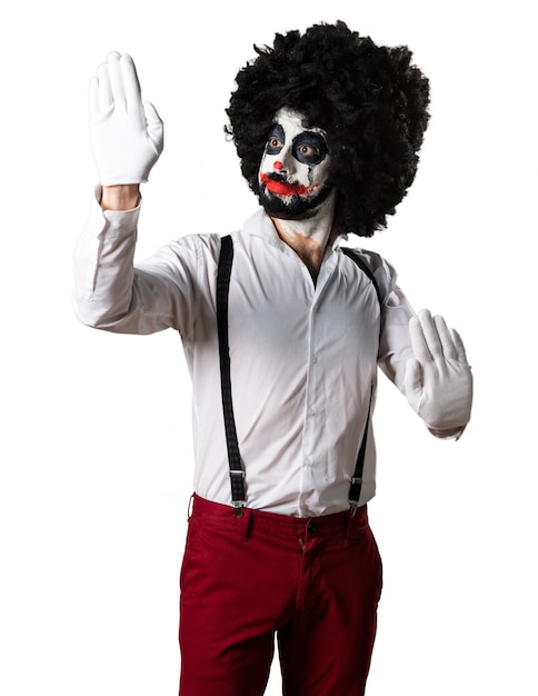 Killer-Clown macht den Mime