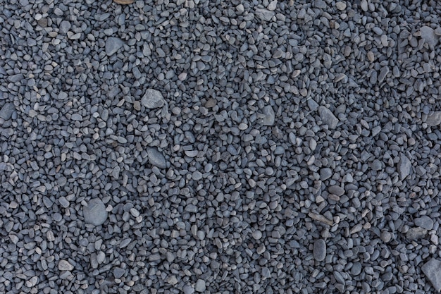 Kleine graue Steine für den Bau am Boden