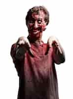 Kostenloses Foto lächeln zombie mit erhobenen armen
