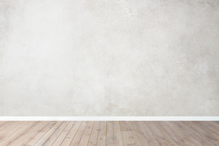 Kostenlose Foto leeres zimmer mit grauen wänden, zimmer mit holzboden