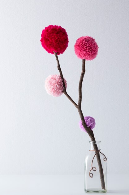 Lila und rosa Pom Poms Hintergrund