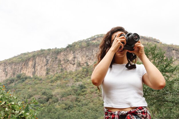 Low Angle Female Capturing Natur